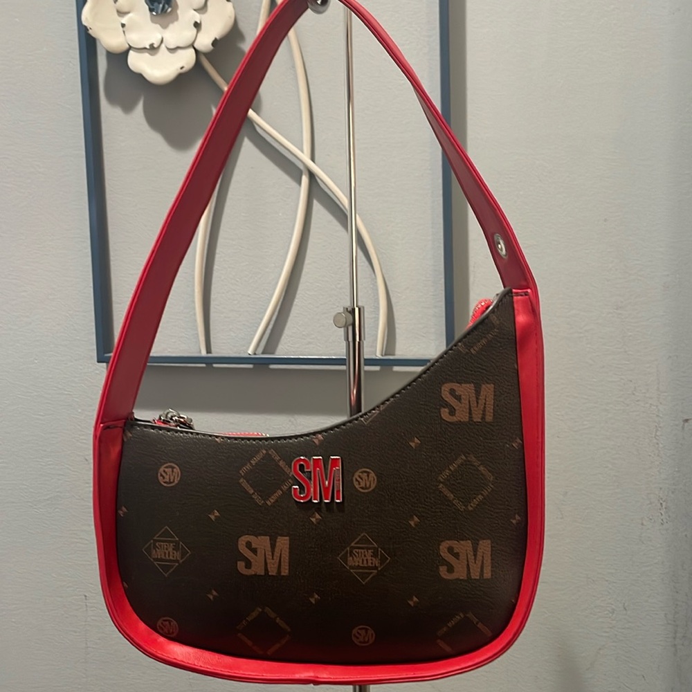 Steve Madden shoulder bag. Red strap.